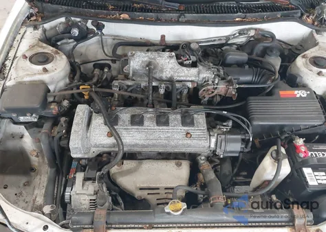 1997 Toyota Corolla Dx z USA, uszkodzony, nr VIN 2T1BB02E3VC181698